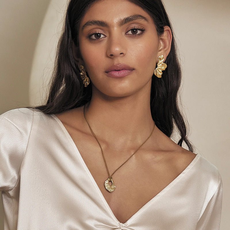 Find Stassia Gold Earrings - Arms of Eve at Bungalow Trading Co.