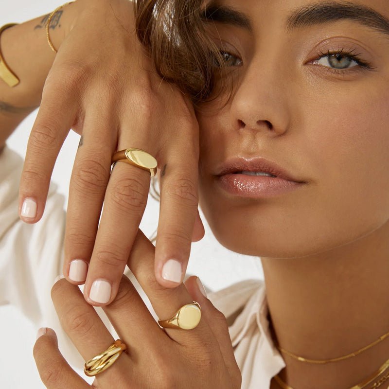 Find Aster Gold Signet Ring - Arms of Eve at Bungalow Trading Co.