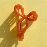 Find Bow Claw Clip Amber - Urban Products at Bungalow Trading Co.