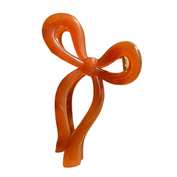 Find Bow Claw Clip Amber - Urban Products at Bungalow Trading Co.