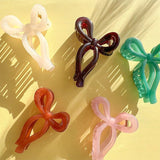 Find Bow Claw Clip Brown - Urban Products at Bungalow Trading Co.