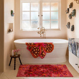 Find Candy Pink Long Bath Mat - Bonnie & Neil at Bungalow Trading Co.