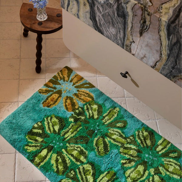 Find Candy Teal Long Bath Mat - Bonnie & Neil at Bungalow Trading Co.