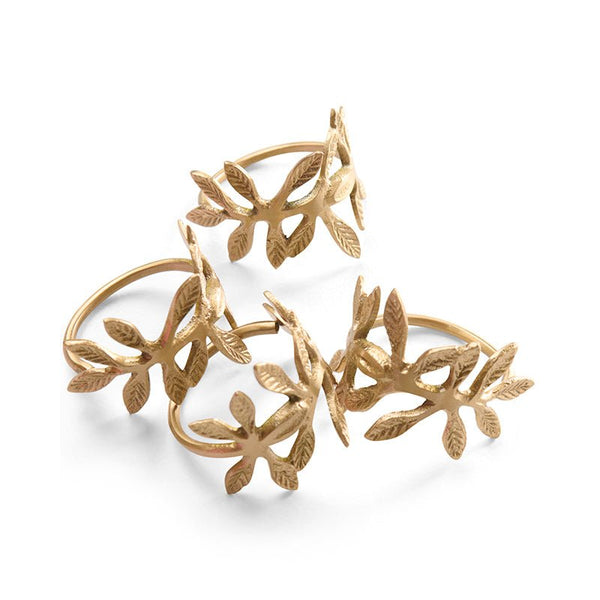 Find Fleur Brass Napkin Rings Set of 4 - Kip & Co at Bungalow Trading Co.