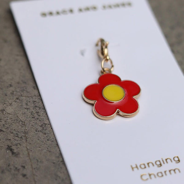 Find Hanging Charm Daisy Red/Yellow - Grace and James at Bungalow Trading Co.