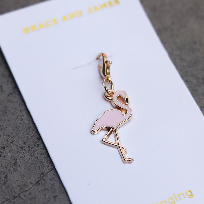 Find Hanging Charm Flamingo - Grace and James at Bungalow Trading Co.