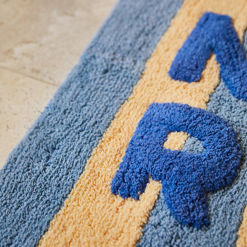 Find Ira Nudie Rudie Bath Mat Blue Jean - Sage & Clare at Bungalow Trading Co.