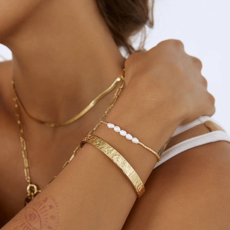 Find Olivia Gold Cuff Bracelet - Arms of Eve at Bungalow Trading Co.