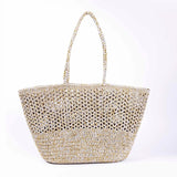 Find Romy Beige Gold Crochet Basket - French Bazaar at Bungalow Trading Co.