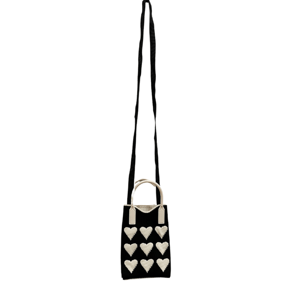 Find Mini Knit Phone Crossbody Black White Hearts - Bungalow Trading Co. at Bungalow Trading Co.