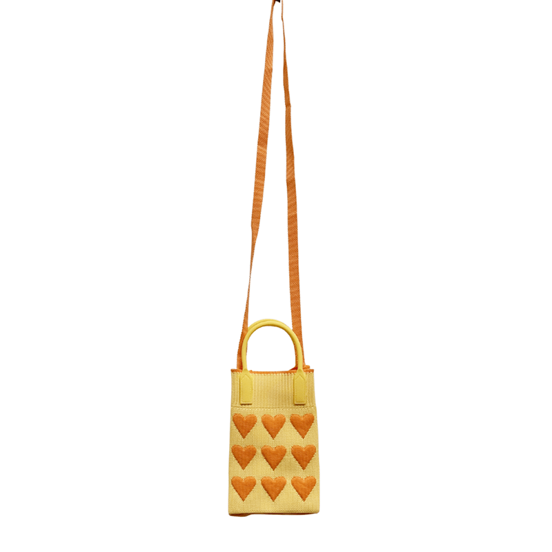 Find Mini Knit Phone Crossbody Yellow Orange Hearts - Bungalow Trading Co. at Bungalow Trading Co.