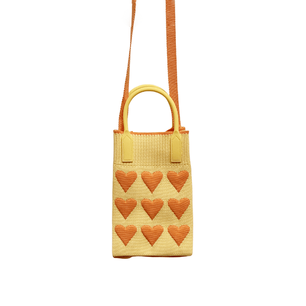 Find Mini Knit Phone Crossbody Yellow Orange Hearts - Bungalow Trading Co. at Bungalow Trading Co.